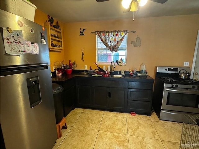 kitchen with ceiling fan, sink, light tile patterned floors, and stainless steel appliances