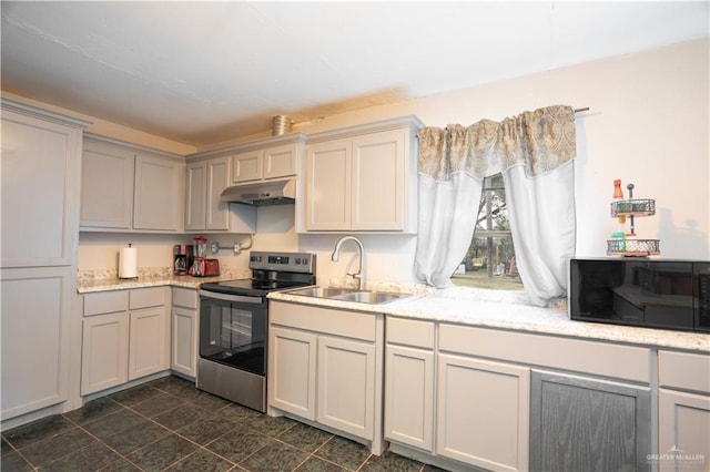 kitchen with gray cabinets, light stone countertops, sink, and stainless steel range with electric cooktop