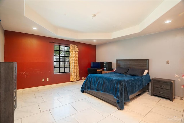 bedroom featuring a tray ceiling