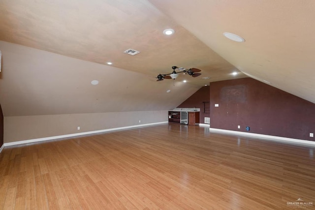 3222 Princess St, Edinburg, TX 78539 - additional living space with wood finished floors, baseboards, lofted ceiling, and recessed lighting