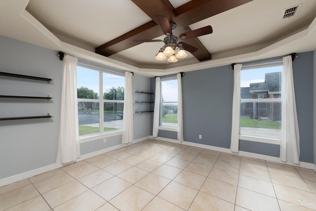3222 Princess St, Edinburg, TX 78539 - empty room featuring a ceiling fan, light tile patterned floors, coffered ceiling, beam ceiling, and baseboards