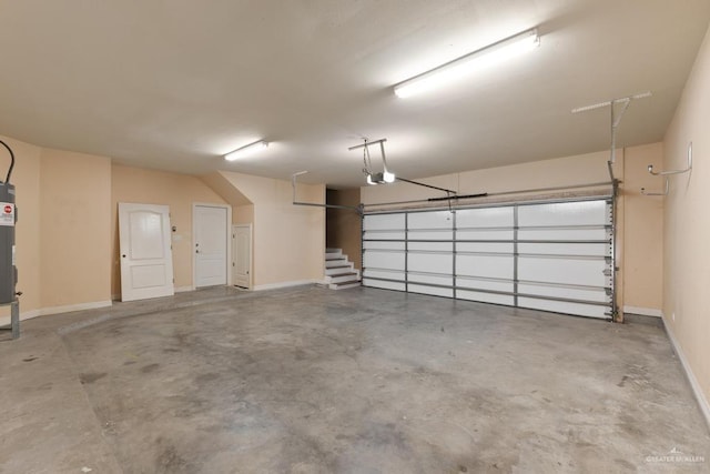 3222 Princess St, Edinburg, TX 78539 - garage with a garage door opener and baseboards