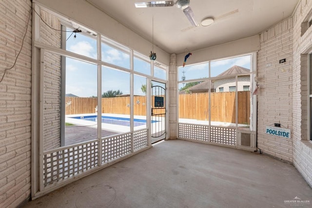 3222 Princess St, Edinburg, TX 78539 - unfurnished sunroom with a ceiling fan