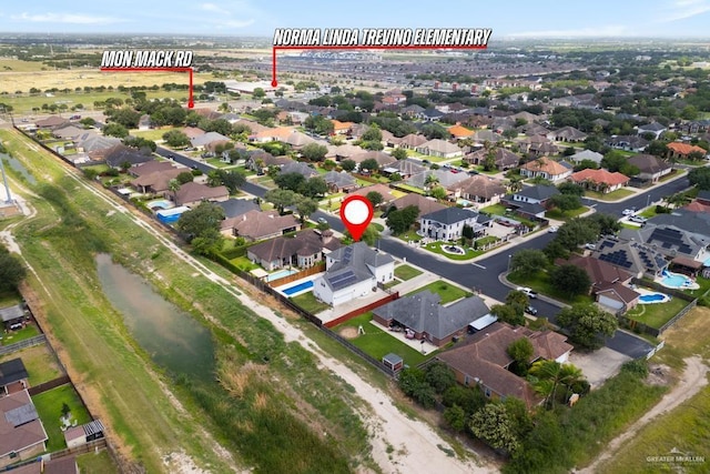 3222 Princess St, Edinburg, TX 78539 - aerial view of property and surrounding area featuring a large body of water and nearby suburban area