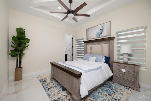 bedroom featuring ceiling fan and multiple windows