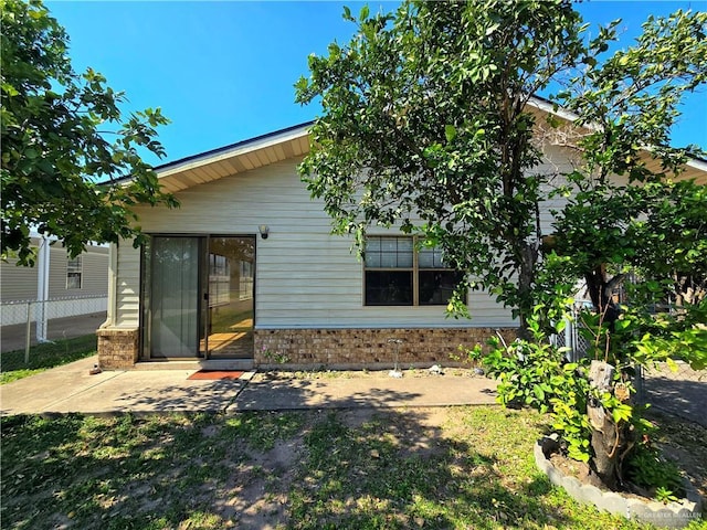 2028 Loker St, Mission, TX 78572 - back of house featuring brick siding