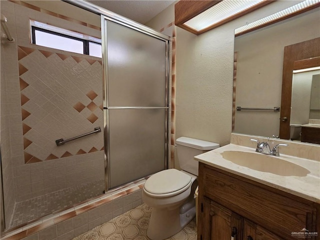 2028 Loker St, Mission, TX 78572 - full bath featuring a shower stall, toilet, and vanity