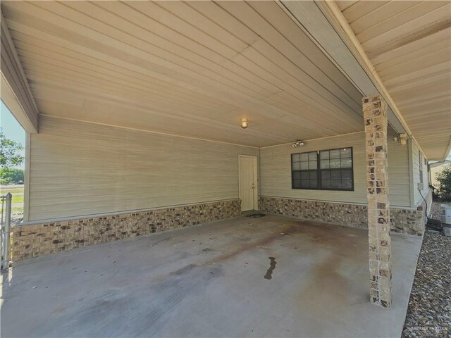 2028 Loker St, Mission, TX 78572 - view of patio featuring an attached carport and central air condition unit