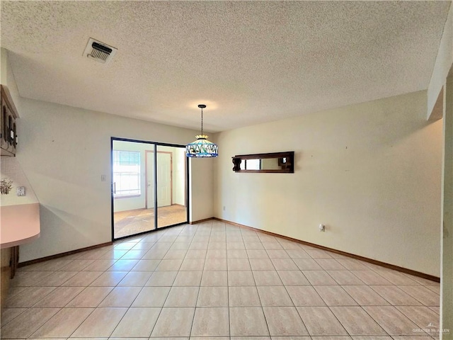 2028 Loker St, Mission, TX 78572 - empty room with a textured ceiling and baseboards