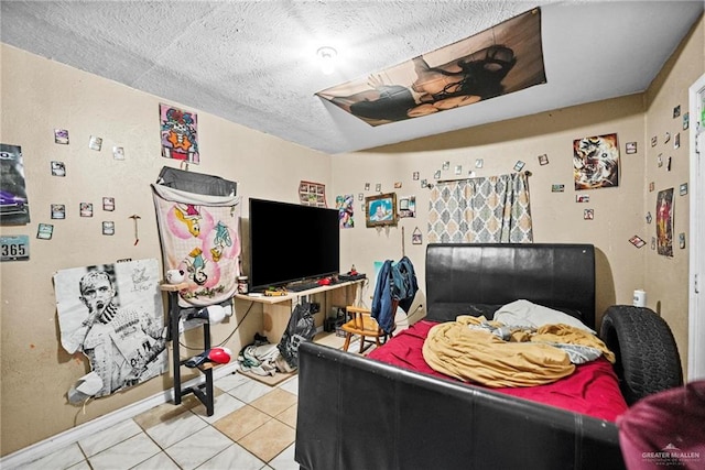 bedroom featuring tile patterned flooring