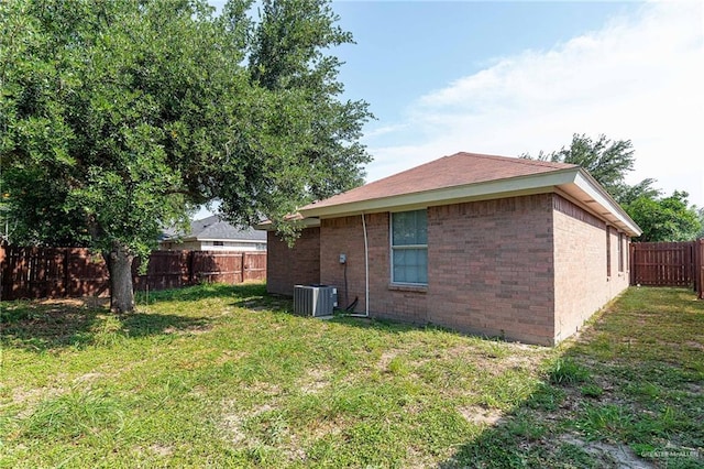 3004 Diaz Ave, Mcallen, TX 78503 - view of home's exterior with brick siding and central AC