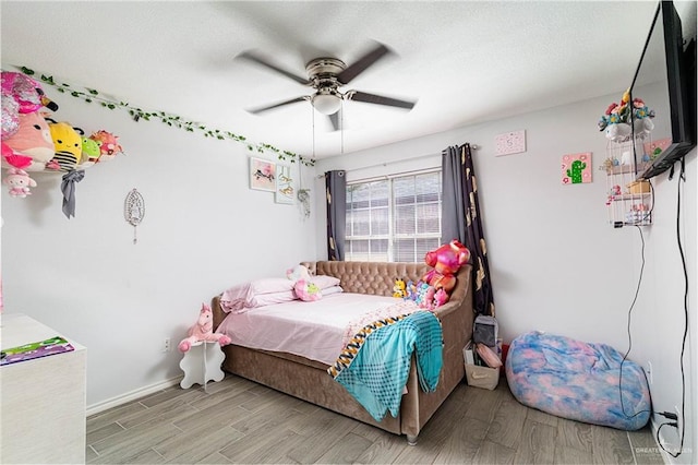 3004 Diaz Ave, Mcallen, TX 78503 - bedroom featuring light wood-type flooring, ceiling fan, and baseboards