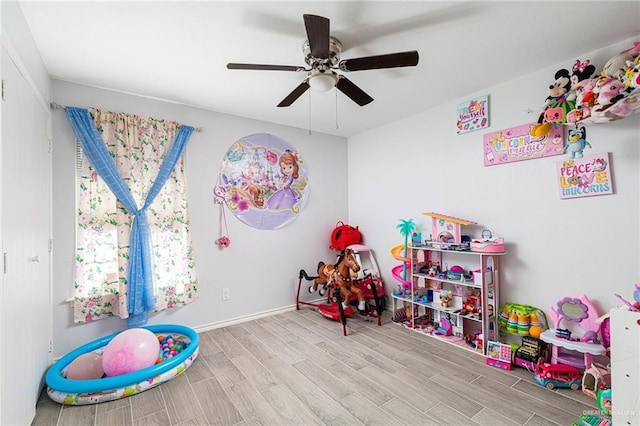 3004 Diaz Ave, Mcallen, TX 78503 - recreation room featuring wood finished floors, a ceiling fan, and baseboards