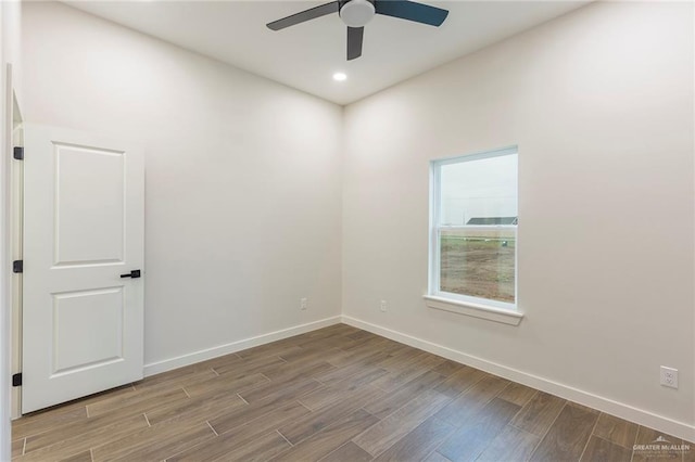 spare room with ceiling fan