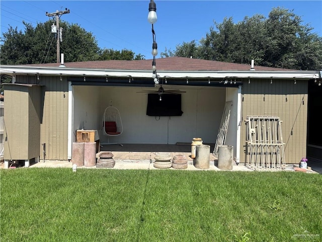 409 Redwood Ave, Mcallen, TX 78501 - rear view of house featuring a lawn