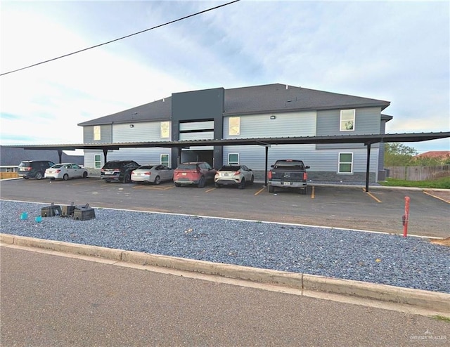 view of parking featuring a carport