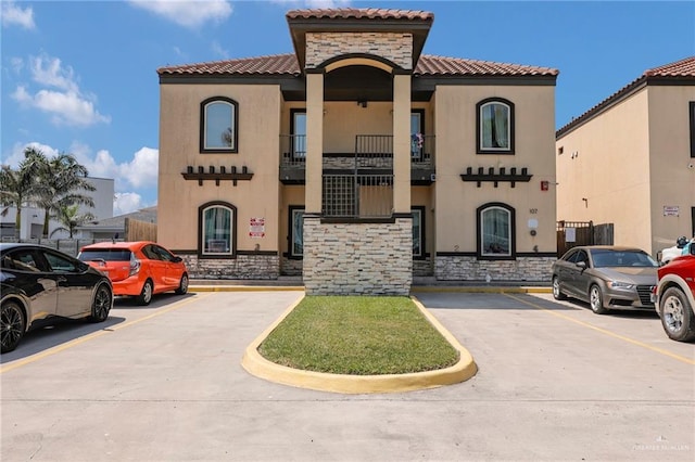 107 E Pike St Unit 2, South Padre Island, TX 78597 - view of building exterior with uncovered parking