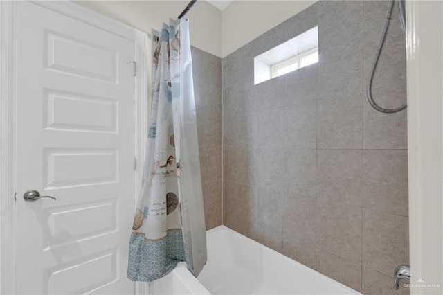 107 E Pike St Unit 2, South Padre Island, TX 78597 - full bathroom featuring shower / tub combo