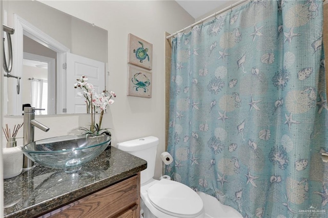 107 E Pike St Unit 2, South Padre Island, TX 78597 - full bath with vanity, toilet, and a shower with shower curtain