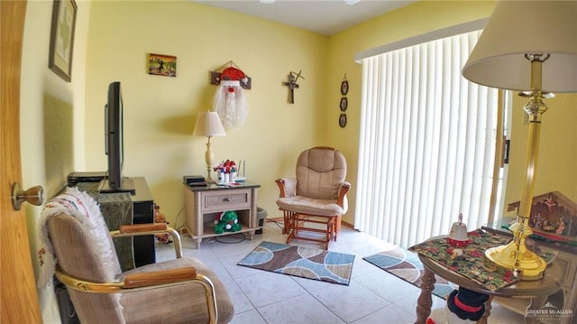 living area with light tile patterned floors