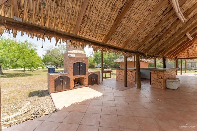 view of patio / terrace with a gazebo and exterior kitchen