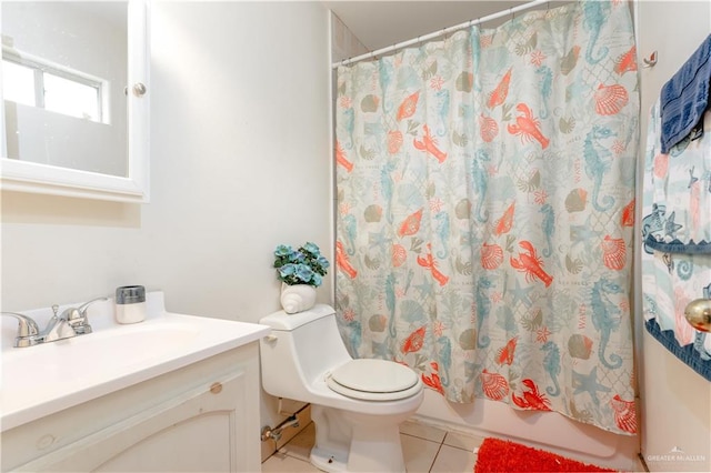 full bathroom featuring tile patterned flooring, vanity, toilet, and shower / tub combo with curtain