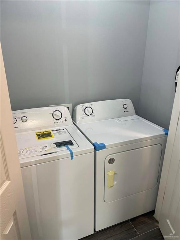 washroom with washer and dryer