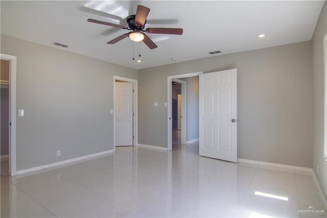 interior space featuring recessed lighting, baseboards, visible vents, and light tile patterned flooring