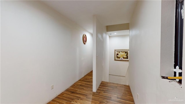 hallway featuring dark wood-type flooring