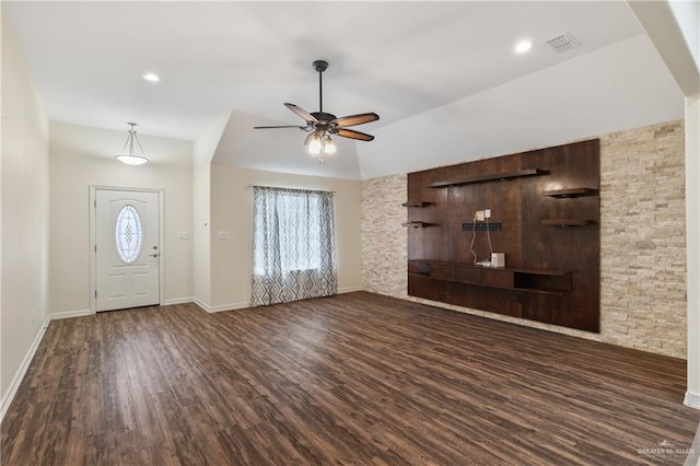 foyer with ceiling fan and dark wood-type flooring