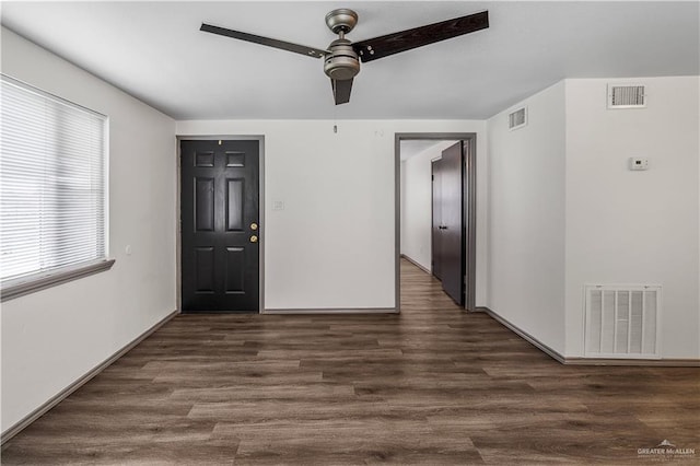 entryway featuring ceiling fan and dark hardwood / wood-style floors