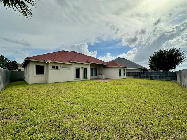 2301 Mcleod Ave, Edinburg, TX 78539 - back of property featuring a fenced backyard and stucco siding