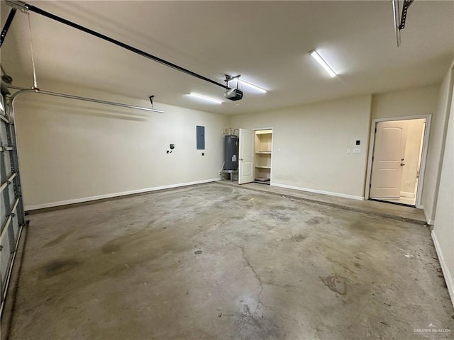 2301 Mcleod Ave, Edinburg, TX 78539 - garage featuring a garage door opener, electric panel, and water heater