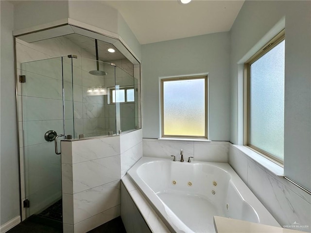 2301 Mcleod Ave, Edinburg, TX 78539 - full bathroom with a shower stall and a jetted tub