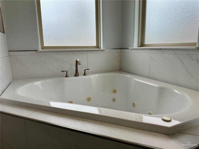 2301 Mcleod Ave, Edinburg, TX 78539 - full bathroom with healthy amount of natural light and a whirlpool tub