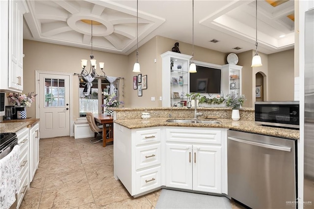 kitchen with sink, white cabinets, stainless steel appliances, and coffered ceiling