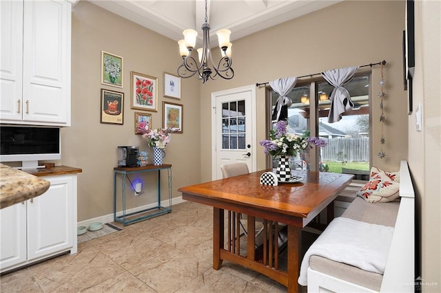 dining area with a notable chandelier