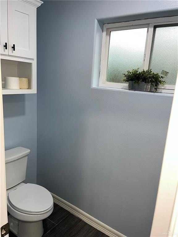 bathroom featuring toilet