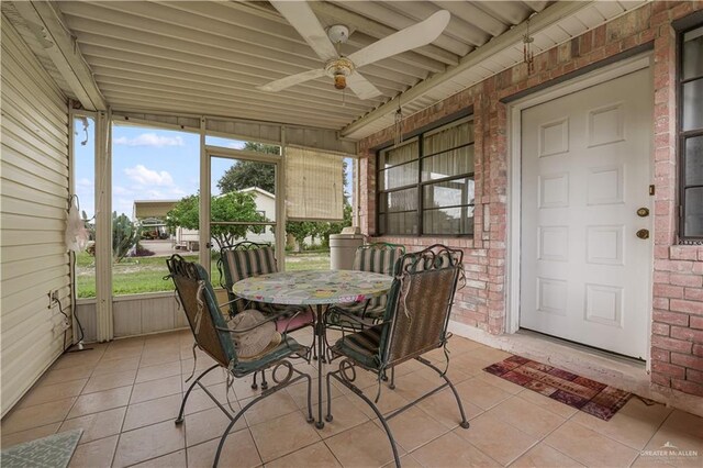 1009 Las Flores Dr, Alamo, TX 78516 - sunroom / solarium with a ceiling fan and outdoor dining space
