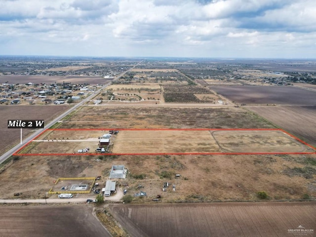 birds eye view of property featuring a rural view