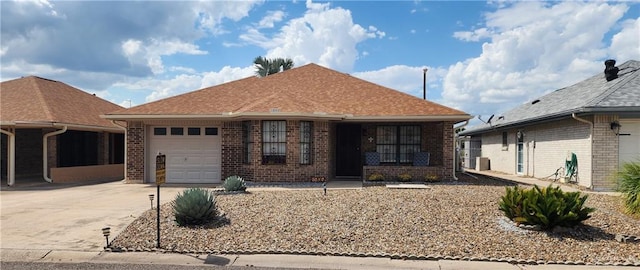 ranch-style home with a garage