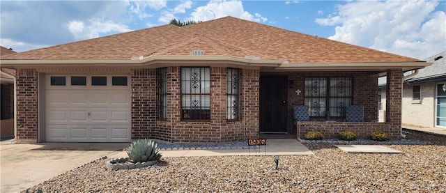 single story home featuring a garage