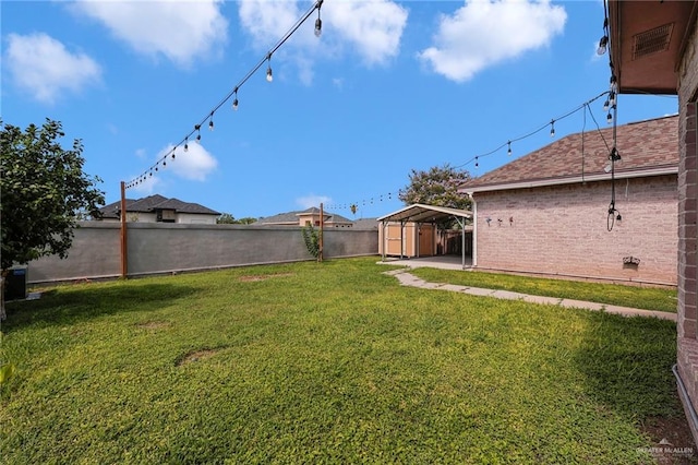 3313 Roadrunner Dr, Edinburg, TX 78541 - fenced backyard with a storage unit and a carport