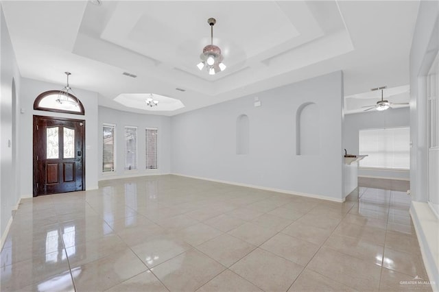 3313 Roadrunner Dr, Edinburg, TX 78541 - foyer entrance with a tray ceiling, a ceiling fan, and light tile patterned floors
