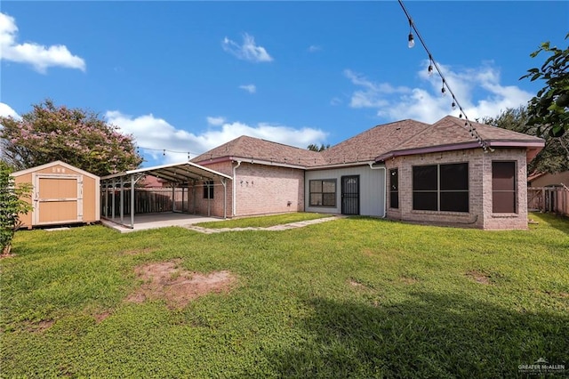 3313 Roadrunner Dr, Edinburg, TX 78541 - rear view of property featuring a storage unit, a detached carport, brick siding, and a patio