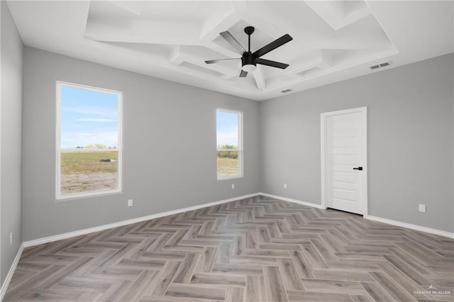 spare room with light parquet floors and ceiling fan