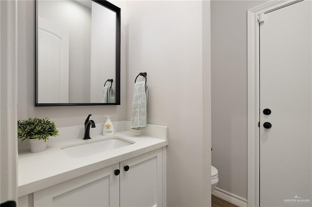 13811 N 33rd Ln, Mcallen, TX 78504 - bathroom featuring vanity and toilet