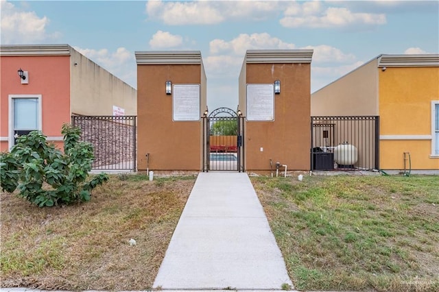 view of property with fence