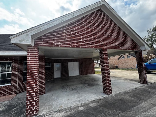 exterior space featuring a carport