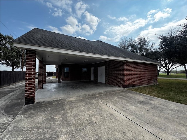 view of home's exterior with a carport